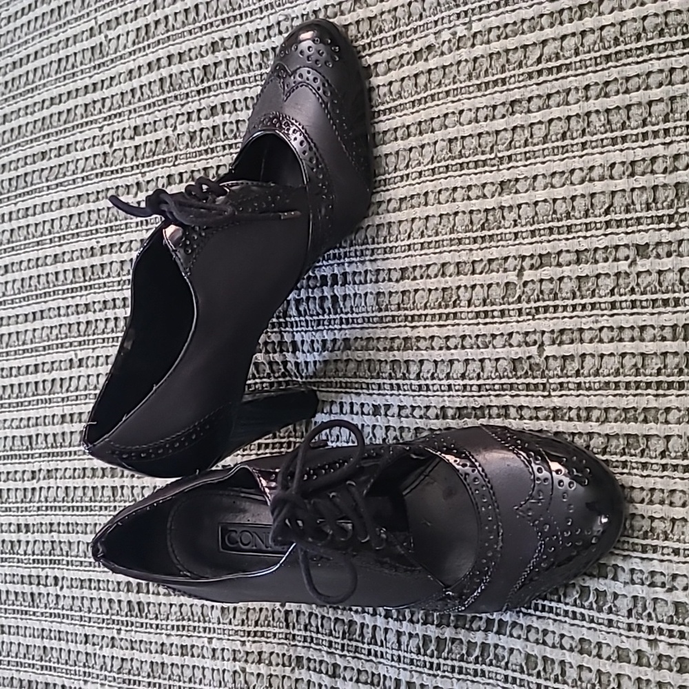 Connie black patent & leather lace-up w cut out vamp. 7